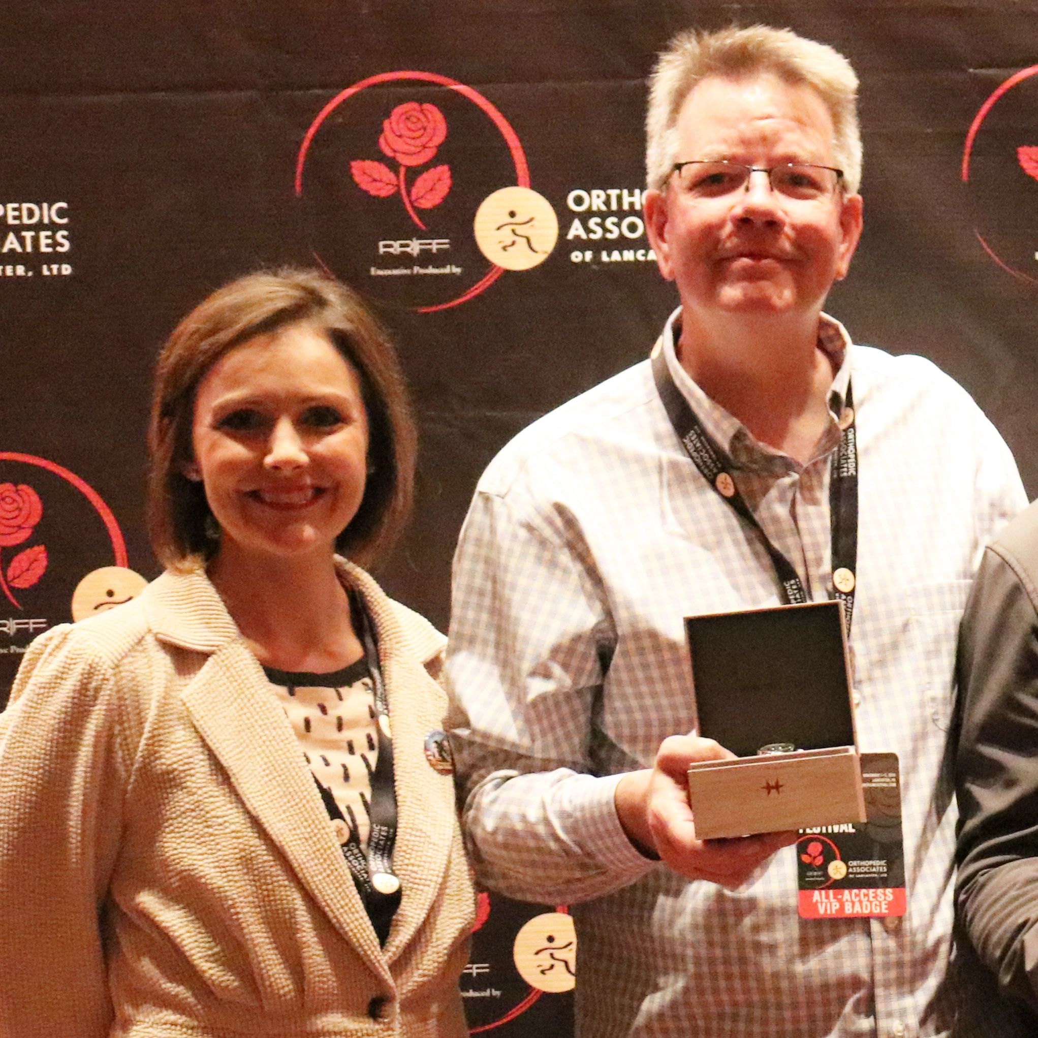 Amanda Melby and Bruce Dellis on the red carpet at the 2019 Red Rose Film Festival